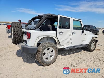 Trzecie zdjęcie samochodu z tyłu: 2012 JEEP WRANGLER UNLIMITED SAHARA VIN:1C4BJWEG2CL180910 - miniatura