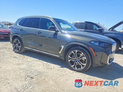 Czwarte zdjęcie samochodu z boku: 2026 BMW X5 XDRIVE50E VIN:5UX43EU08T9039076 - miniatura