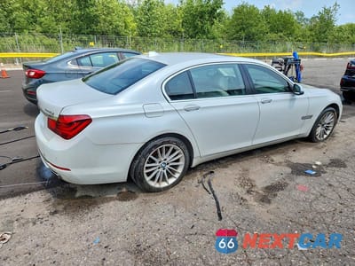 Trzecie zdjęcie samochodu z tyłu: 2013 BMW 750 LXI VIN:WBAYF8C54DDE59036 - miniatura