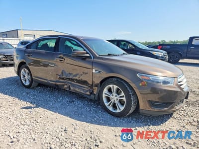 Czwarte zdjęcie samochodu z boku: 2015 FORD TAURUS SEL VIN:1FAHP2E8XFG159218 - miniatura