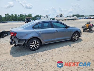 Trzecie zdjęcie samochodu z tyłu: 2017 VOLKSWAGEN JETTA SE VIN:3VWDB7AJ3HM309365 - miniatura