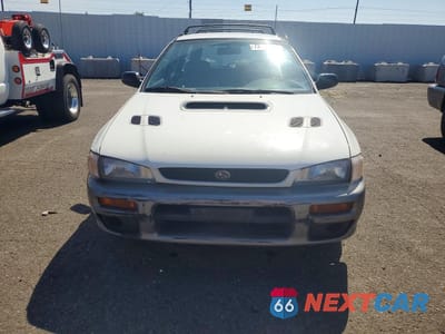Piąte zdjęcie samochodu w środku: 1997 SUBARU IMPREZA OUTBACK VIN:JF1GF4859VH813713 - miniatura