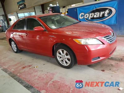 Czwarte zdjęcie samochodu z boku: 2007 TOYOTA CAMRY HYBRID VIN:JTNBB46K573029503 - miniatura