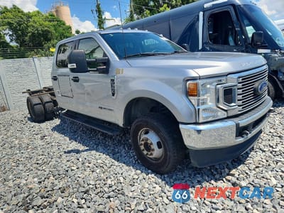 Czwarte zdjęcie samochodu z boku: 2022 FORD F350 SUPER DUTY VIN:1FT8W3DT6NEF29955 - miniatura