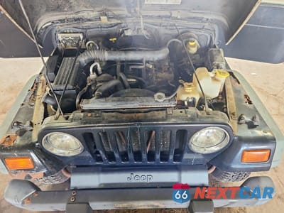 Zdjęcie 11 z 12 samochodu: 1999 JEEP WRANGLER / TJ SPORT VIN:1J4FY19S0XP471865 - miniatura