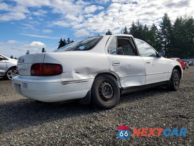 Trzecie zdjęcie samochodu z tyłu: 1996 TOYOTA CAMRY DX VIN:JT2BG12K9T0342214 - miniatura