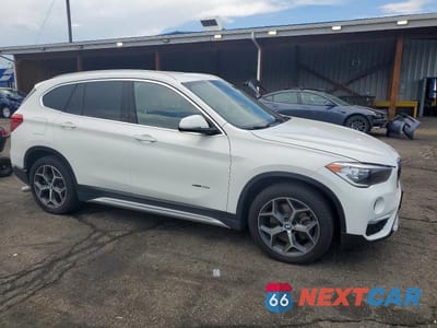 Czwarte zdjęcie samochodu z boku: 2018 BMW X1 XDRIVE28I VIN:WBXHT3C36J5K25323 - miniatura