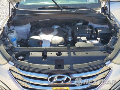 Zdjęcie 11 z 12 samochodu: 2013 HYUNDAI SANTA FE SPORT 2.0T VIN:5XYZU3LA5DG119423 - miniatura