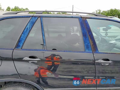 Zdjęcie 11 z 14 samochodu: 2001 BMW X5 4.4I VIN:WBAFB33521LH10420 - miniatura