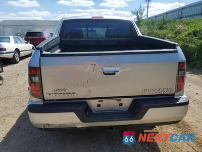 Zdjęcie 6 z 12 samochodu: 2013 HONDA RIDGELINE SPORT VIN:5FPYK1F78DB011124 - miniatura