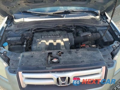 Zdjęcie 12 z 13 samochodu: 2006 HONDA PILOT EX VIN:2HKYF18536H547640 - miniatura