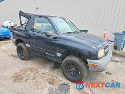 Czwarte zdjęcie samochodu z boku: 1999 CHEVROLET TRACKER VIN:2CNBE1867X6929902 - miniatura