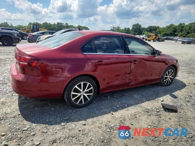 Trzecie zdjęcie samochodu z tyłu: 2017 VOLKSWAGEN JETTA SE VIN:3VWDB7AJ2HM336878 - miniatura