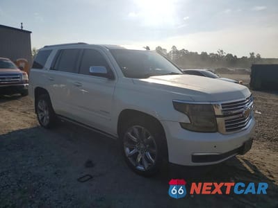 Czwarte zdjęcie samochodu z boku: 2015 CHEVROLET TAHOE K1500 LTZ VIN:1GNSKCKC9FR281108 - miniatura