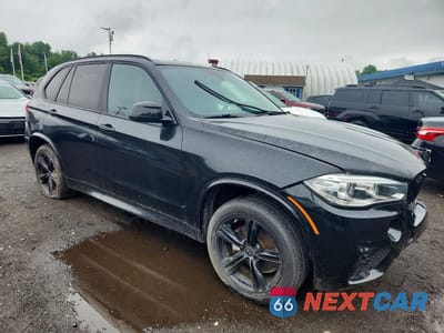 Czwarte zdjęcie samochodu z boku: 2014 BMW X5 SDRIVE35I VIN:5UXKR2C56E0C01136 - miniatura