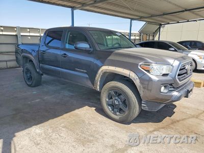 Czwarte zdjęcie samochodu z boku: 2019 TOYOTA TACOMA SR5 VIN:5TFAX5GN0KX159948 - miniatura