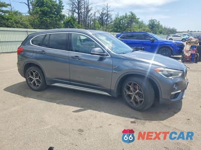 Czwarte zdjęcie samochodu z boku: 2016 BMW X1 XDRIVE28I VIN:WBXHT3C38G5E53254 - miniatura