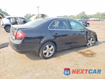 Trzecie zdjęcie samochodu z tyłu: 2009 VOLKSWAGEN JETTA SE VIN:3VWRZ71K69M150160 - miniatura