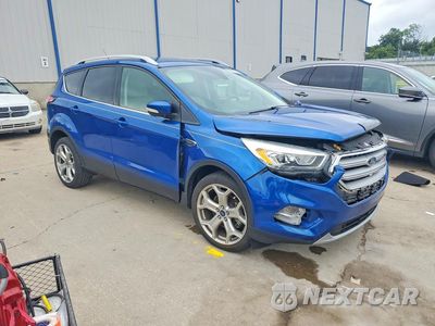 Czwarte zdjęcie samochodu z boku: 2017 FORD ESCAPE TITANIUM VIN:1FMCU0J95HUC93103 - miniatura