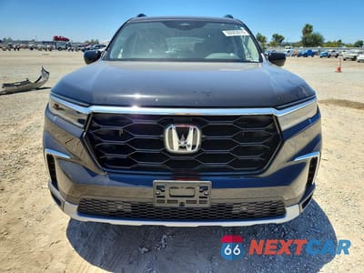 Piąte zdjęcie samochodu w środku: 2025 HONDA PILOT TOURING VIN:5FNYG2H75SB029784 - miniatura