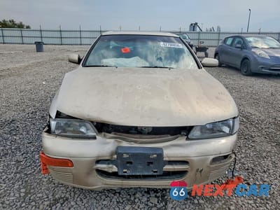 Piąte zdjęcie samochodu w środku: 1995 NISSAN MAXIMA GXE VIN:JN1CA21D2ST031018 - miniatura