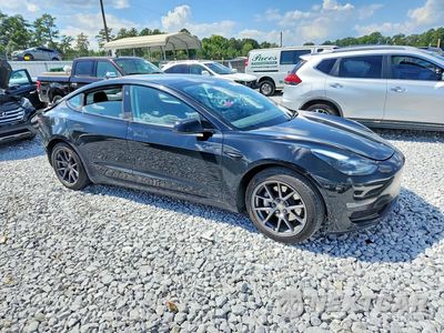 Czwarte zdjęcie samochodu z boku: 2021 TESLA MODEL 3 VIN:5YJ3E1EB0MF035613 - miniatura