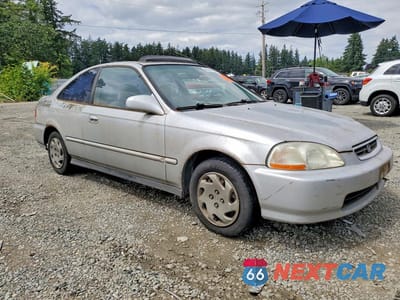 Czwarte zdjęcie samochodu z boku: 1997 HONDA CIVIC EX VIN:1HGEJ8245VL105092 - miniatura