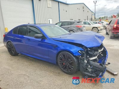 Czwarte zdjęcie samochodu z boku: 2022 BMW M5 VIN:WBS83CH06NCK64273 - miniatura