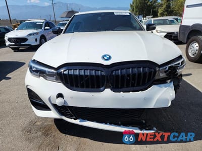 Piąte zdjęcie samochodu w środku: 2022 BMW 330E VIN:3MW5P7J05N8C52264 - miniatura