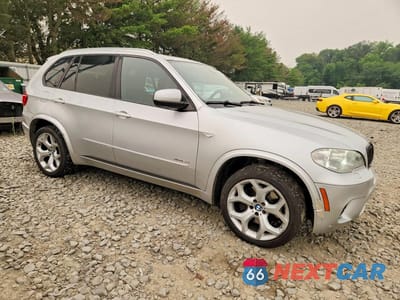 Czwarte zdjęcie samochodu z boku: 2012 BMW X5 XDRIVE50I VIN:5UXZV8C5XCL422986 - miniatura