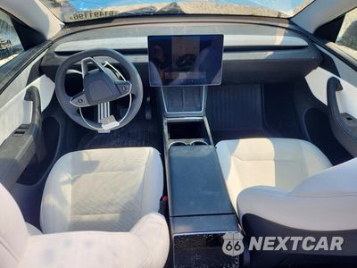 Czwarte zdjęcie samochodu z boku: 2026 TESLA MODEL Y VIN:7SAYGDEE3TA429648 - miniatura