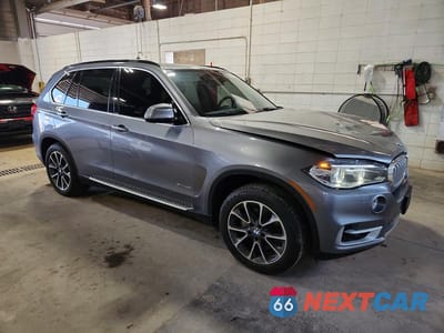 Czwarte zdjęcie samochodu z boku: 2015 BMW X5 XDRIVE35I VIN:5UXKR0C5XF0K60080 - miniatura