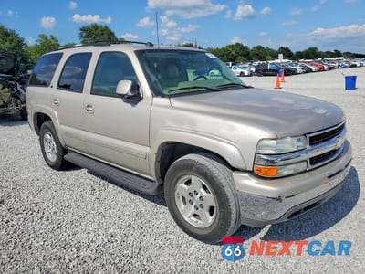 Czwarte zdjęcie samochodu z boku: 2004 CHEVROLET TAHOE C1500 VIN:1GNEC13Z14R179378 - miniatura