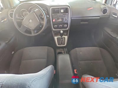 Zdjęcie 8 z 13 samochodu: 2010 DODGE CALIBER MAINSTREET VIN:1B3CB3HA1AD581798 - miniatura