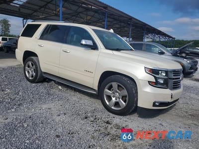 Czwarte zdjęcie samochodu z boku: 2015 CHEVROLET TAHOE C1500 LTZ VIN:1GNSCCKC3FR672610 - miniatura