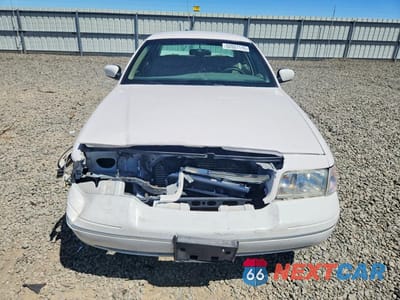 Piąte zdjęcie samochodu w środku: 2002 FORD CROWN VICTORIA LX VIN:2FAFP74W02X152772 - miniatura