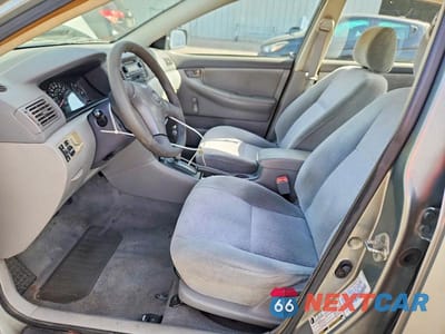 Zdjęcie 7 z 12 samochodu: 2004 TOYOTA COROLLA CE VIN:1NXBR32EX4Z256360 - miniatura