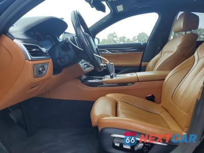 Zdjęcie 7 z 12 samochodu: 2016 BMW 740 I VIN:WBA7E2C50GGD99982 - miniatura