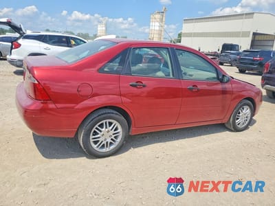 Trzecie zdjęcie samochodu z tyłu: 2005 FORD FOCUS VIN:1FAFP34N25W304678 - miniatura