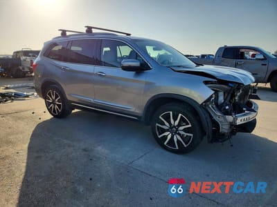 Czwarte zdjęcie samochodu z boku: 2019 HONDA PILOT TOURING VIN:5FNYF5H64KB044384 - miniatura