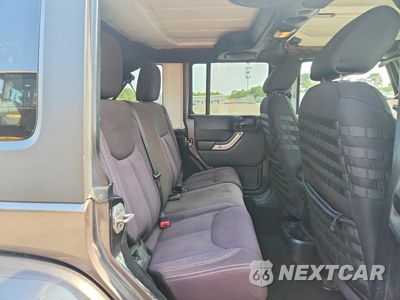 Zdjęcie 11 z 13 samochodu: 2014 JEEP WRANGLER UNLIMITED SAHARA VIN:1C4HJWEG9EL203631 - miniatura