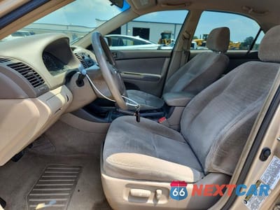 Zdjęcie 7 z 12 samochodu: 2004 TOYOTA CAMRY LE VIN:4T1BE32KX4U292891 - miniatura