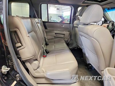 Zdjęcie 11 z 14 samochodu: 2012 HONDA PILOT EXL VIN:5FNYF4H54CB077579 - miniatura
