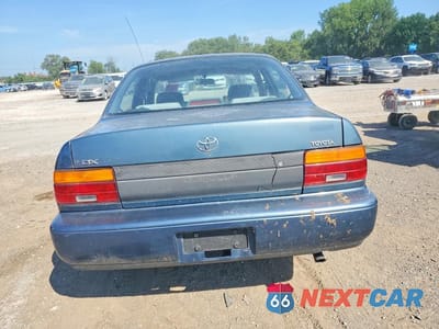 Zdjęcie 6 z 12 samochodu: 1994 TOYOTA COROLLA DX VIN:1NXAE09B0RZ209895 - miniatura