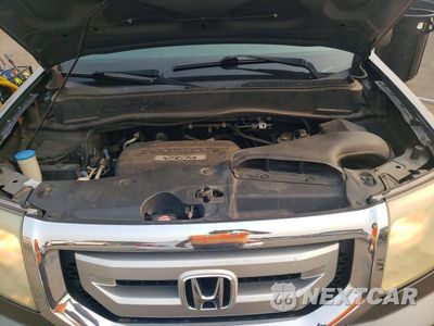 Zdjęcie 12 z 13 samochodu: 2009 HONDA PILOT EXL VIN:5FNYF48509B054213 - miniatura