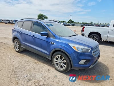 Czwarte zdjęcie samochodu z boku: 2018 FORD ESCAPE SE VIN:1FMCU9GD9JUC37428 - miniatura