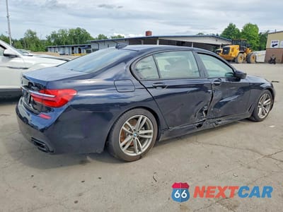 Trzecie zdjęcie samochodu z tyłu: 2019 BMW 750 XI VIN:WBA7F2C59KB240149 - miniatura