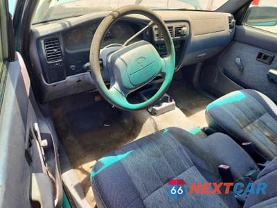 Zdjęcie 8 z 12 samochodu: 1999 TOYOTA TACOMA BASE VIN:4TAVL52N2XZ530930 - miniatura