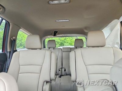 Zdjęcie 10 z 14 samochodu: 2021 HONDA PILOT TOURING VIN:5FNYF6H68MB069913 - miniatura