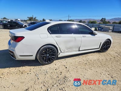 Trzecie zdjęcie samochodu z tyłu: 2022 BMW 740 I VIN:WBA7T2C0XNCJ48253 - miniatura